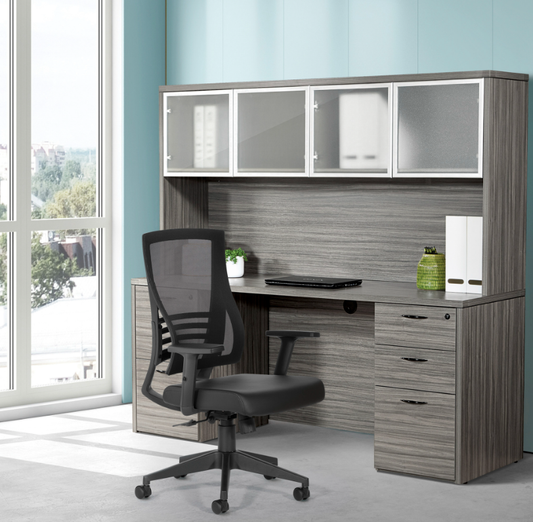 Valiant Products Arthur ergonomic office chair with black mesh back and padded seat in a modern home office setting