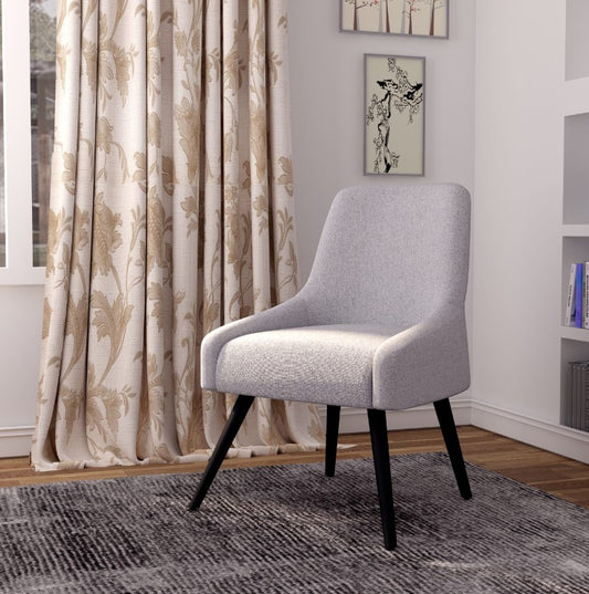 Valiant Products Ellison guest lounge chair with a curved back, light gray poly-linen upholstery, and dark metal legs.