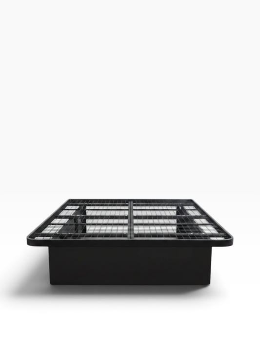 Valiant Products Goliath platform bed base in black steel with a wire grid deck and enclosed side panels.