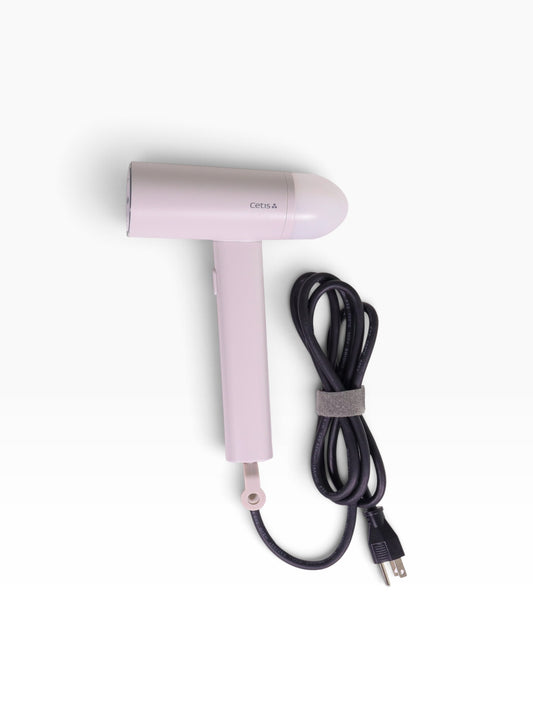 Valiant Products handheld garment steamer in gray with a non-stick base plate and long power cord for easy use