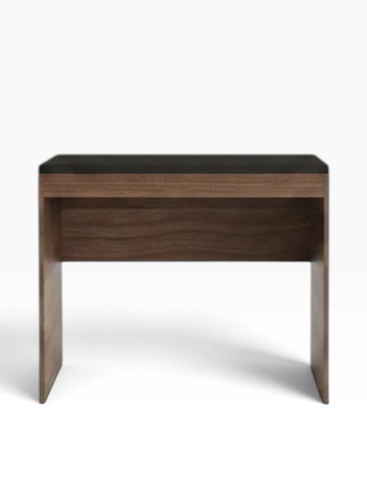 Valiant Products panel desk featuring a dark wood grain finish and a sleek black top surface.