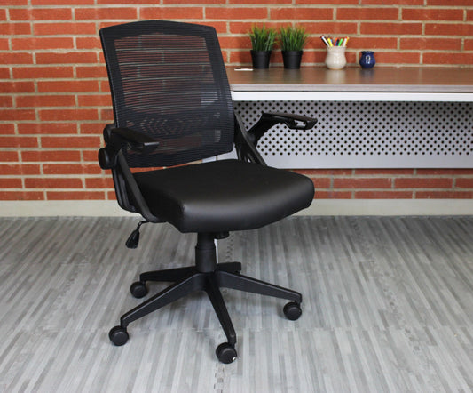 Valiant Products Tycoon ergonomic task chair with black mesh back, antimicrobial vinyl seat, and flip-up arms.
