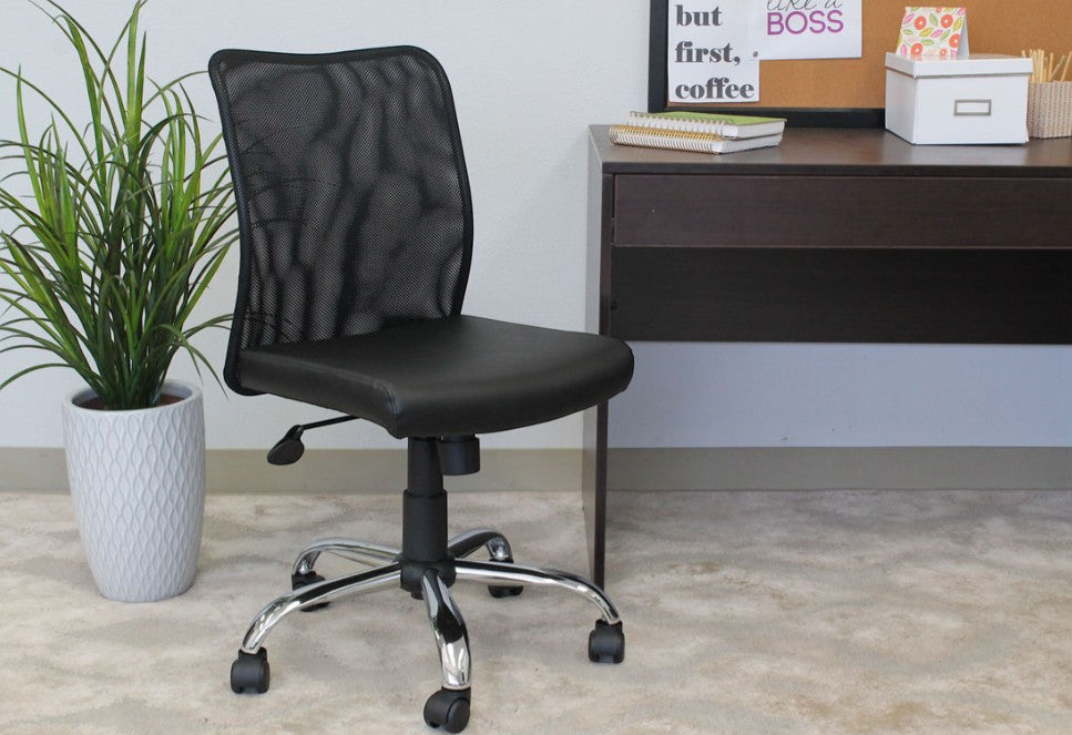 Valiant Products armless ergonomic office chair with black mesh back, vinyl seat, and chrome base in a home office.