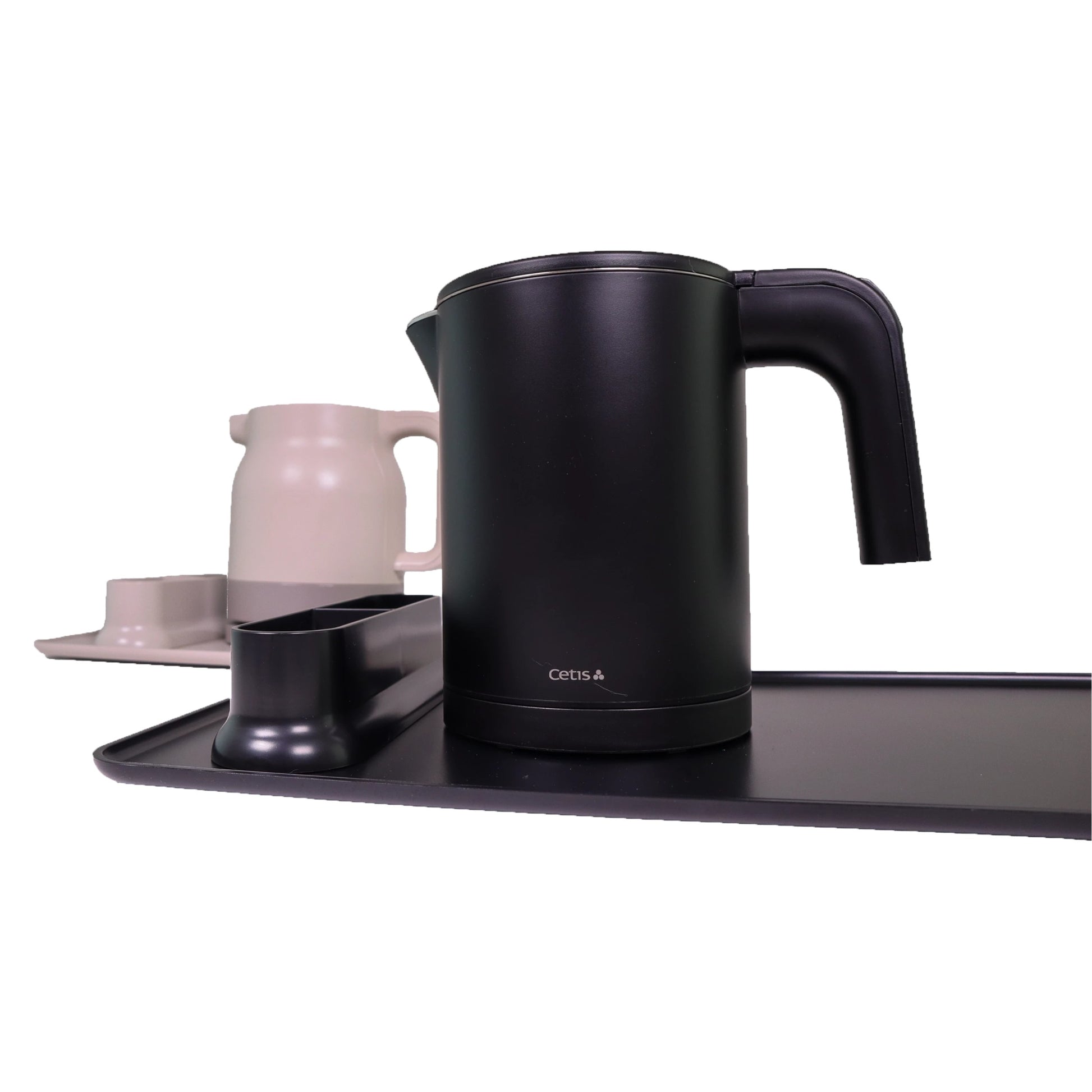 Valiant Products K-608 black electric kettle with anti-scalding insulation and stainless steel liner on a serving tray