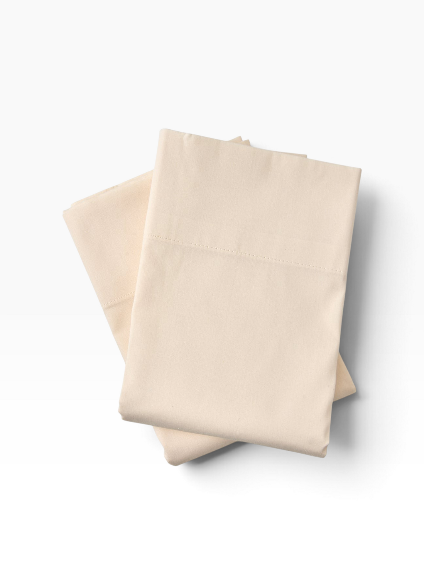 Valiant Products bone-colored T-200 thread count cotton-polyester blend pillowcases with a durable 3-inch hem