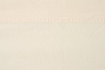 Valiant Products bone colored 200 thread count cotton blend pillowcase with a durable 3-inch hem detail