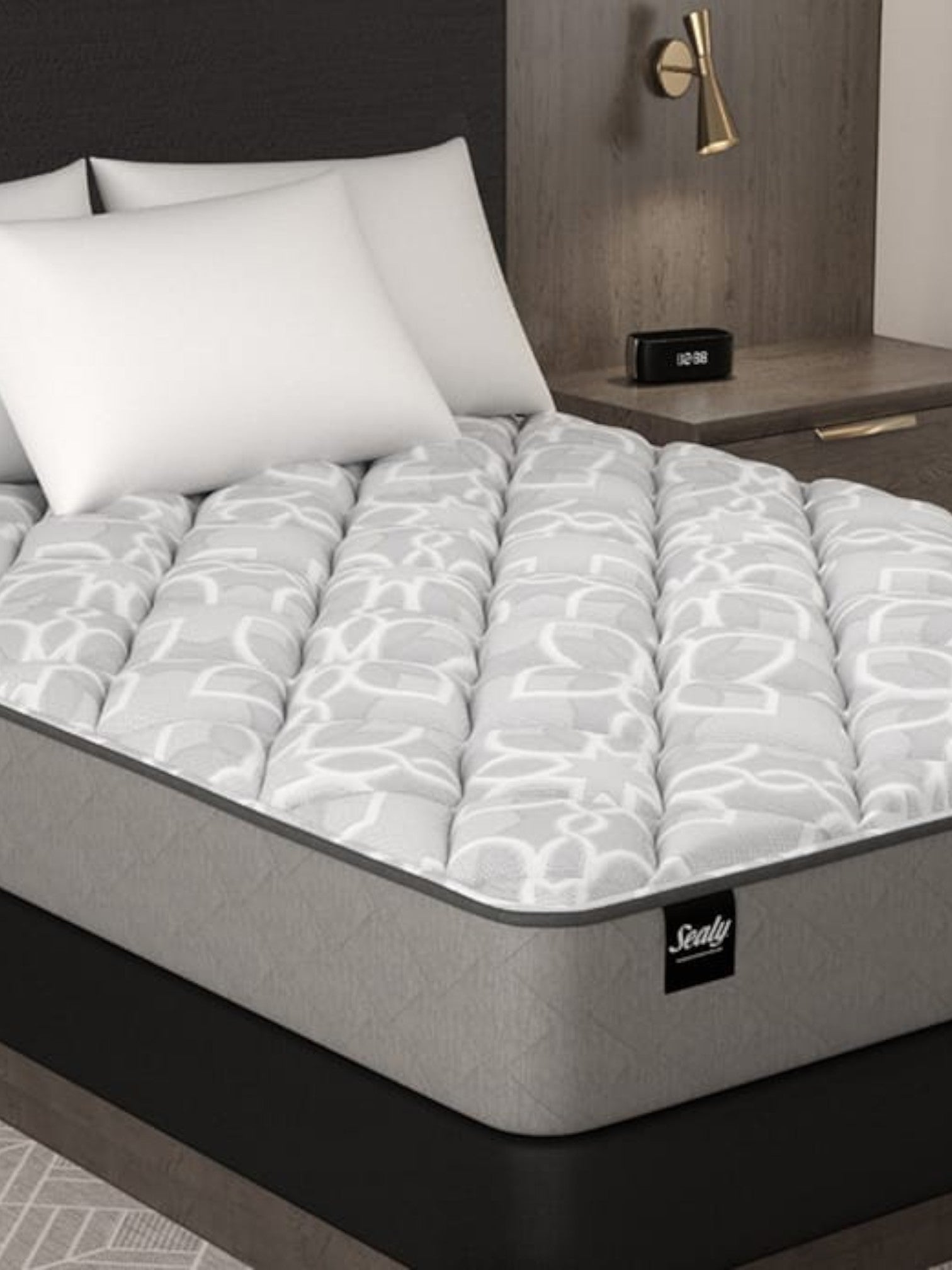 Valiant Products Bremen 10-inch soft gel-infused foam mattress with a grey patterned knit top and white pillows.
