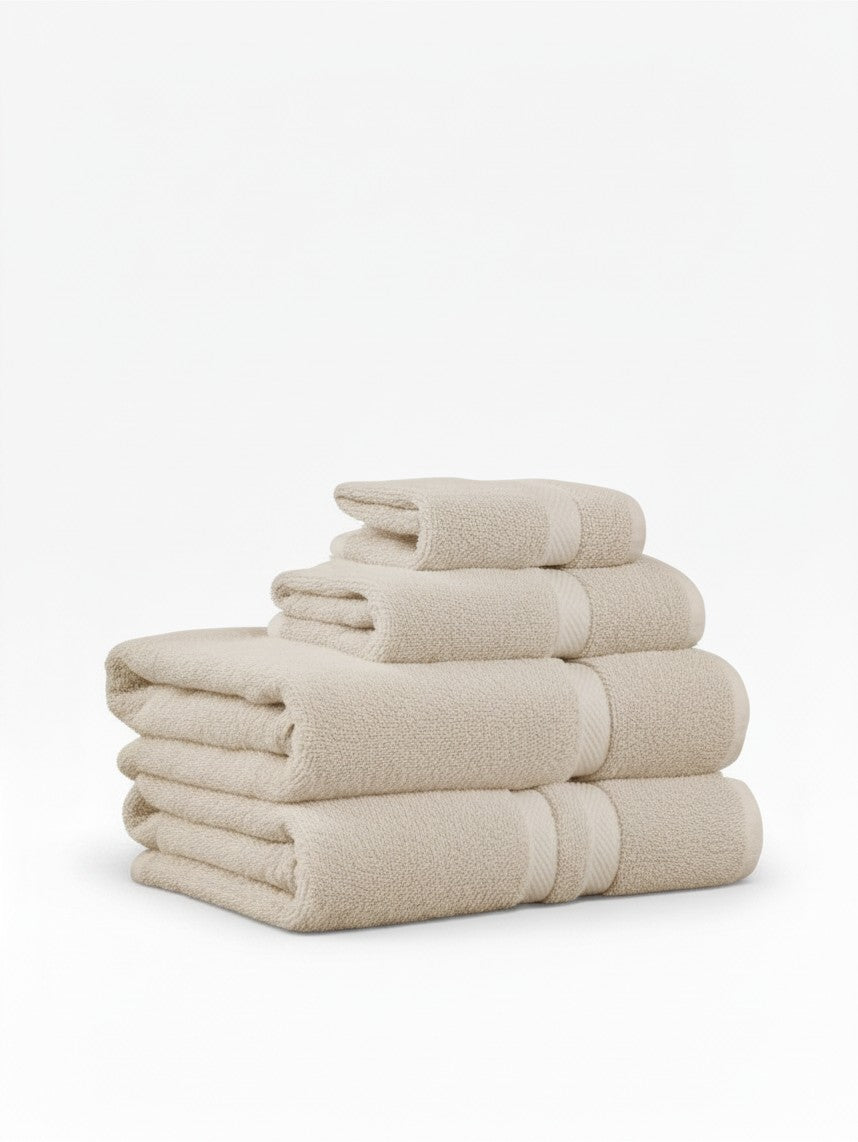 Valiant Products Brentwood ecru ring-spun cotton hand towels with a classic dobby border design stacked neatly.