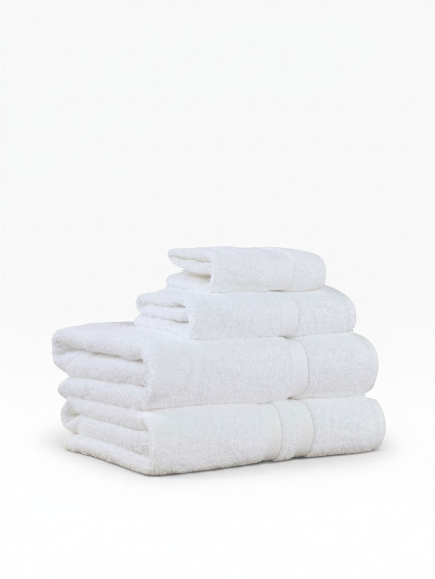 Valiant Products Brentwood white ring-spun cotton hand towels with a classic dobby border design stacked neatly.