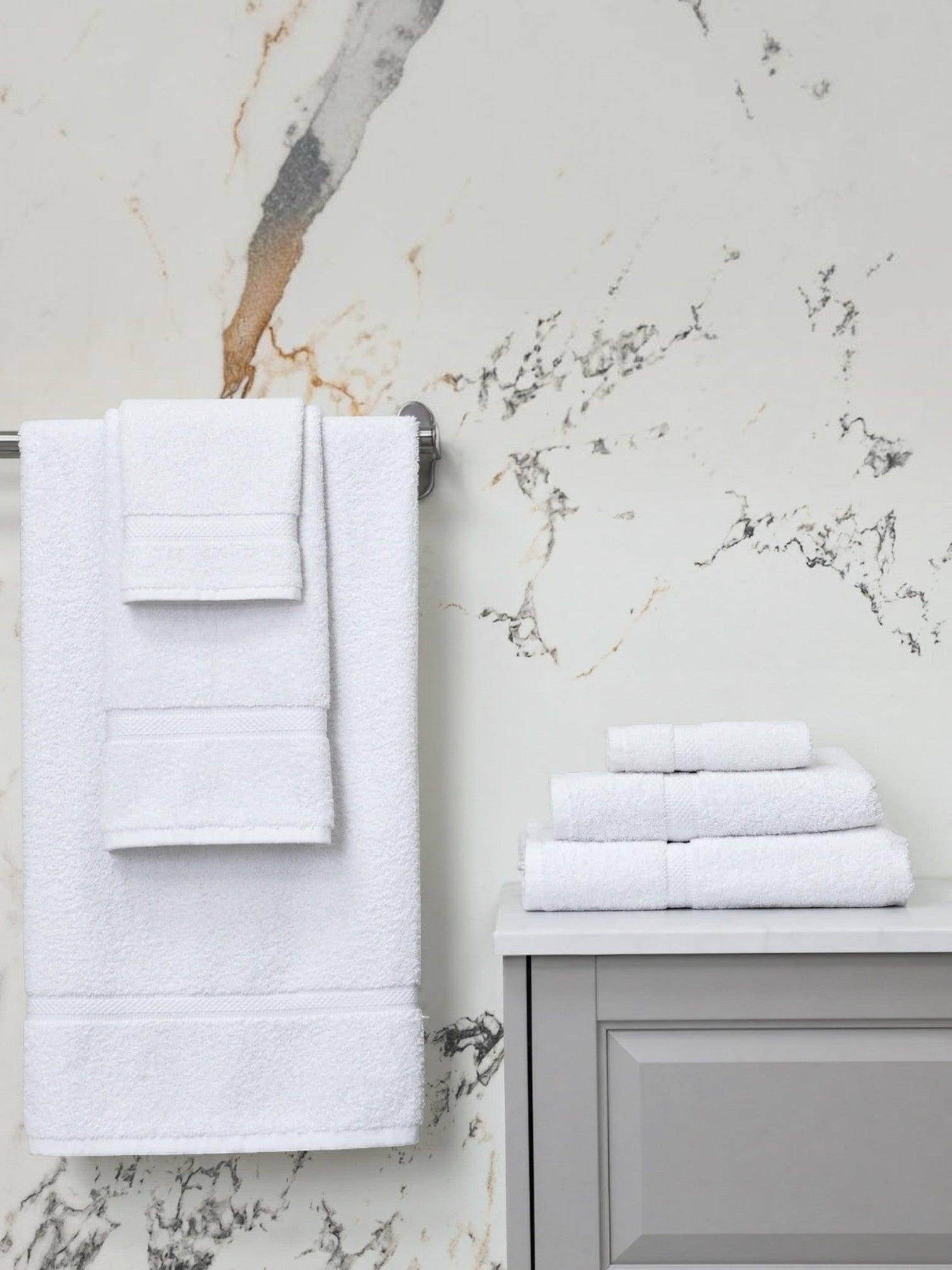 Valiant Products Brentwood white cotton washcloths and towels with dobby border design in a modern bathroom setting