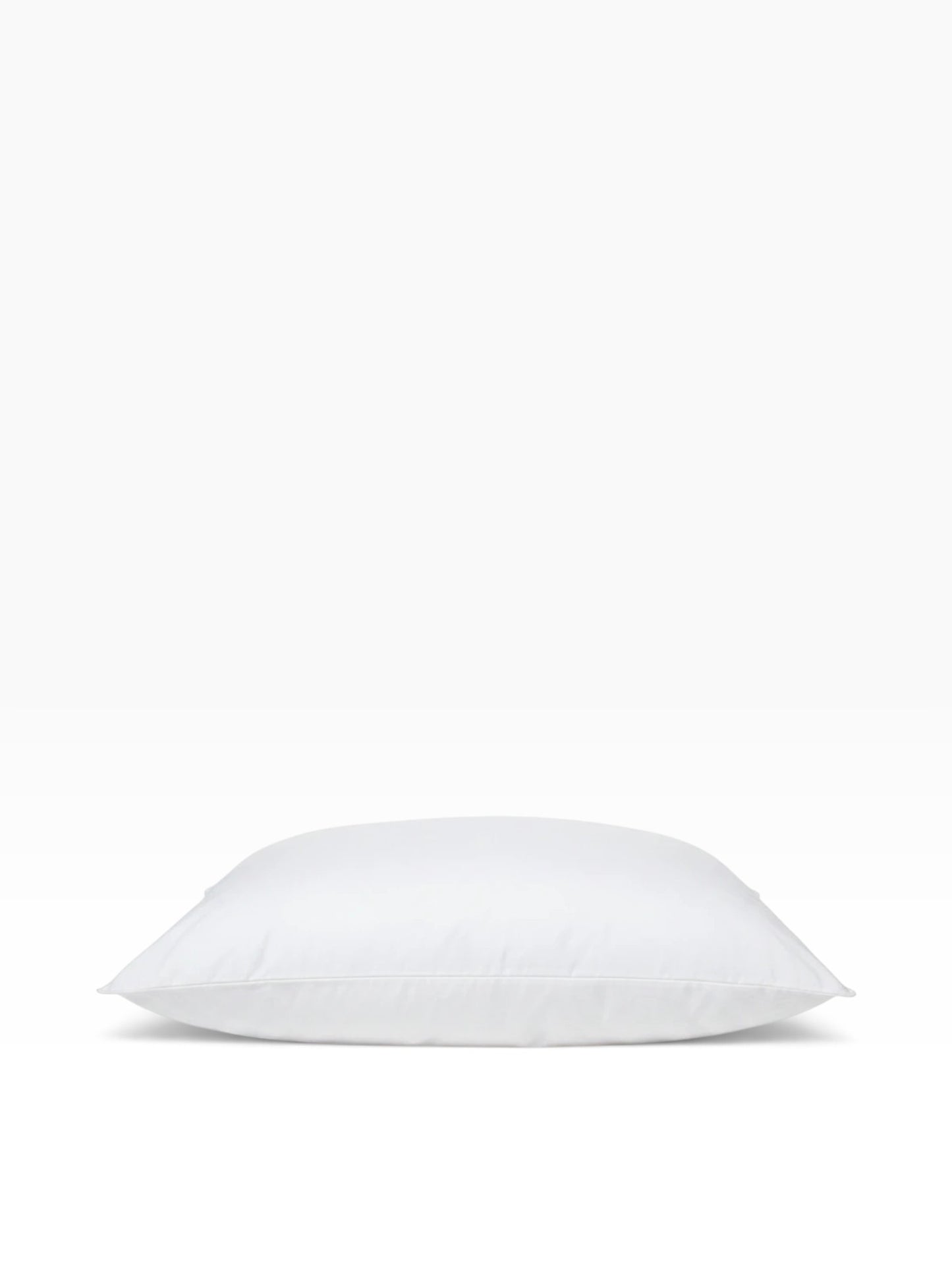 Valiant Products white Brentwood cluster fiber pillow with a soft cotton-polyester blend and durable overlock stitching.
