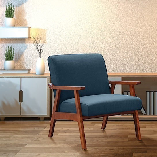 Valiant Products Bunting lounge chair in Klein Azure fabric with a solid wood frame in a modern living room setting