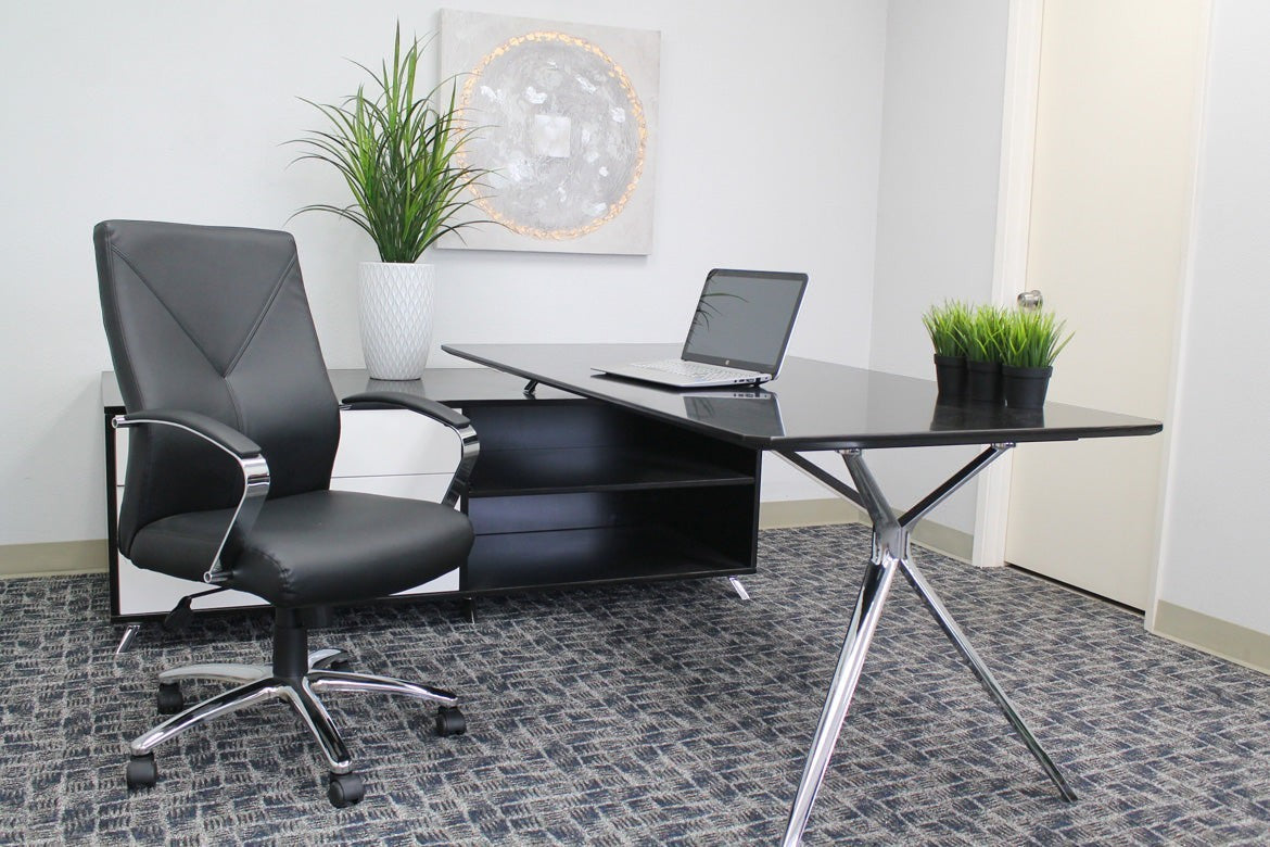 Valiant Products Cahill Executive Ergo Chair in black LeatherPlus with chrome arms and base in a modern office
