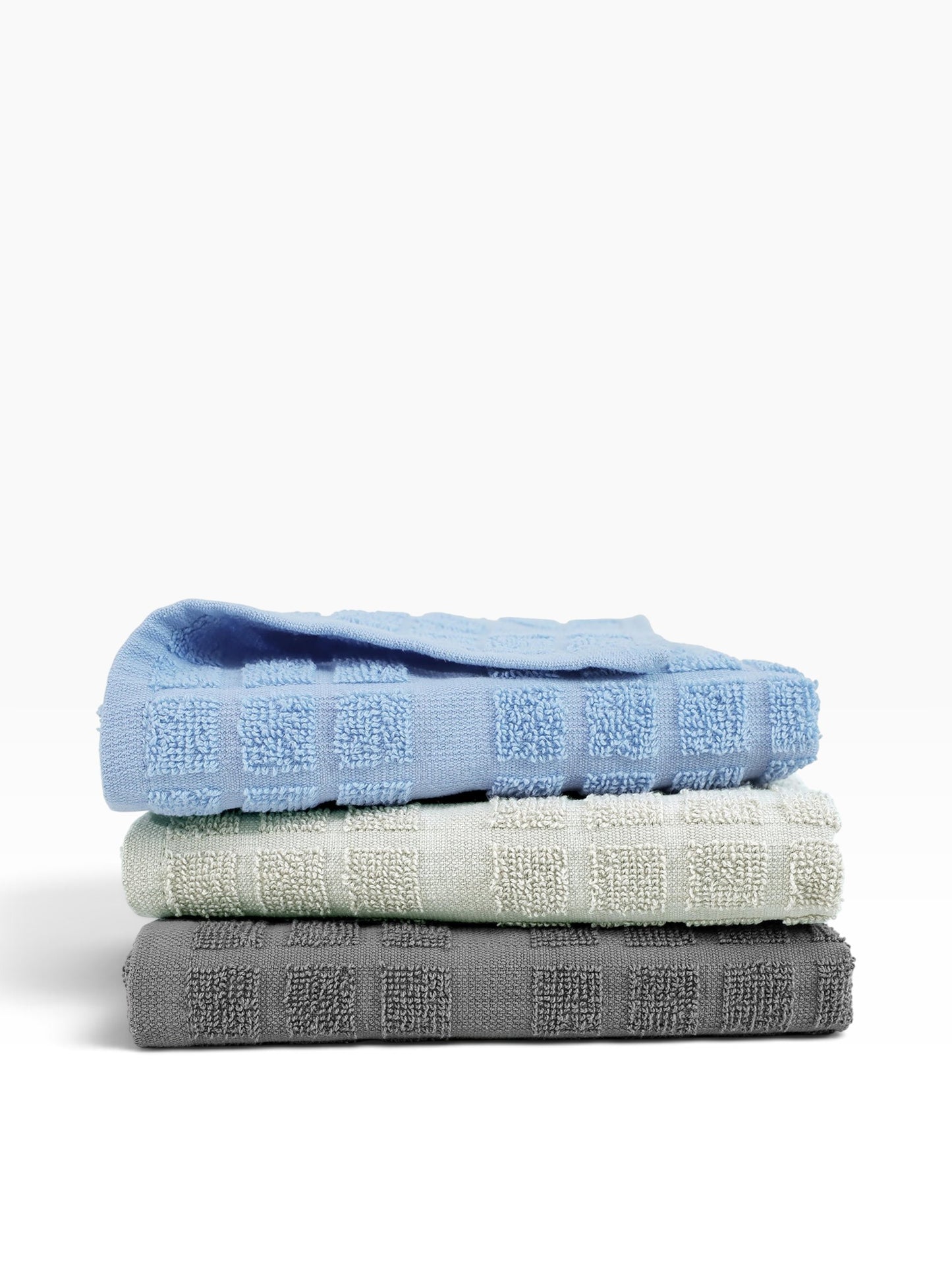 Valiant Products kitchen towels in blue, khaki, and grey, featuring a textured ring spun cotton loop design.