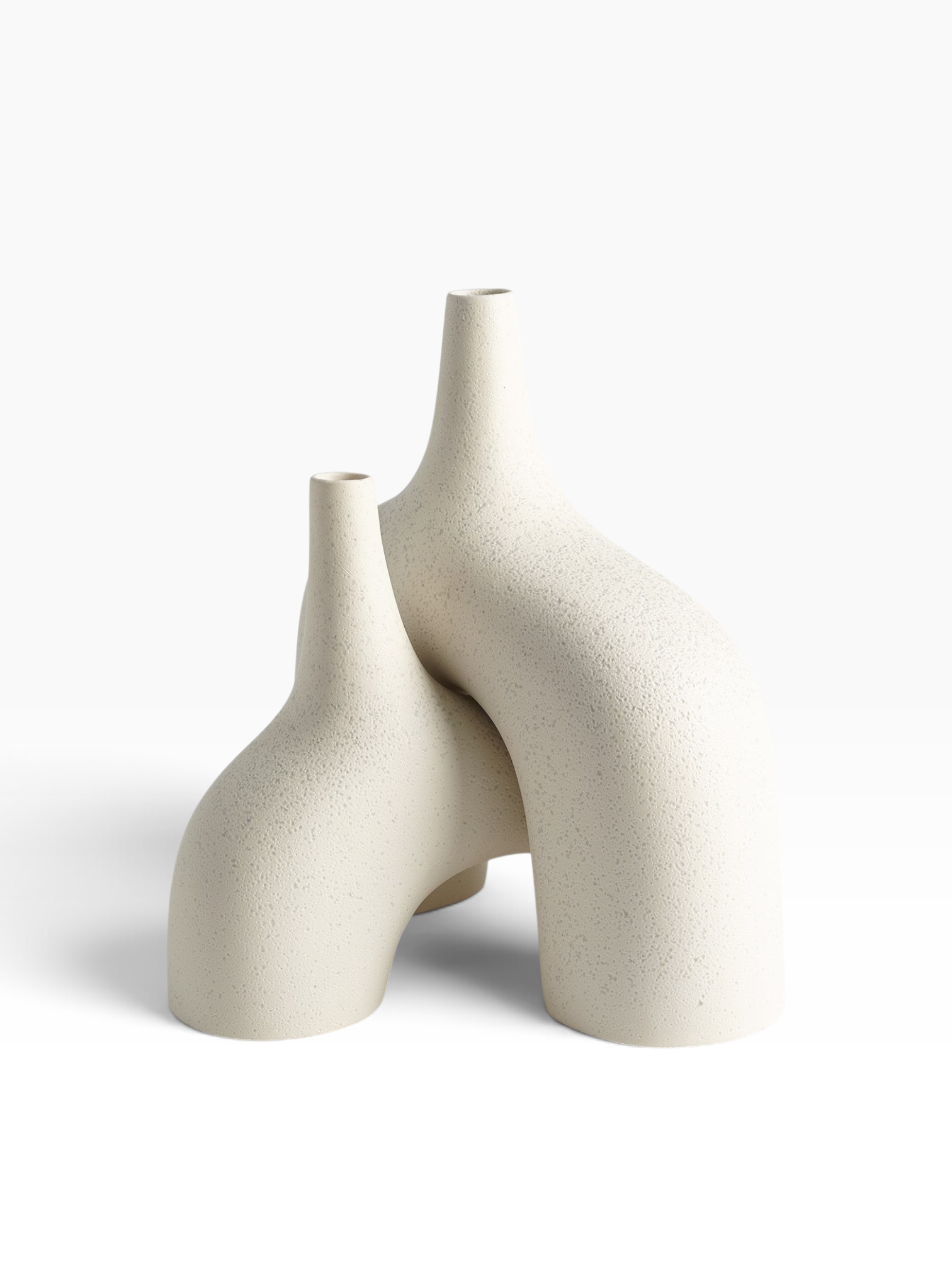 Valiant Products cream stone stretch vases with a textured lava glaze finish in a nested sculptural design.