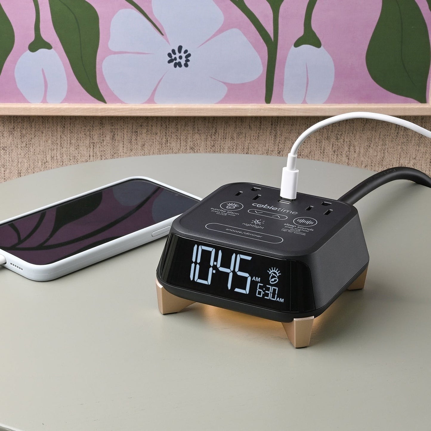 Valiant Products CubieTime Zen black alarm clock with USB-C charging, nightlight, and sleep sounds on a nightstand.