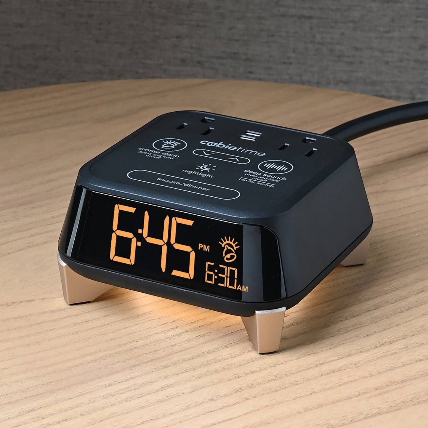 Valiant Products CubieTime Zen black alarm clock with digital display, sleep sounds, and integrated power outlets.