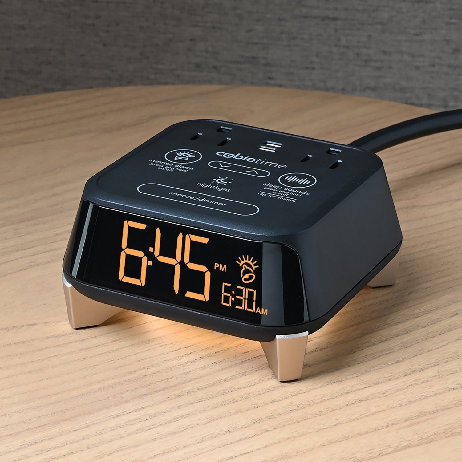 Valiant Products CubieTime Zen black alarm clock with digital display, sleep sounds, and integrated power outlets.
