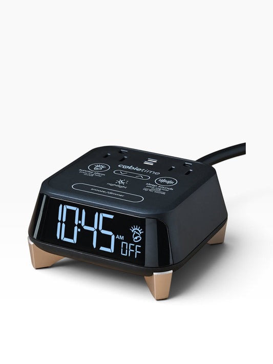 Valiant Products CubieTime Zen black alarm clock with digital display, USB ports, and gold-toned feet on a white background