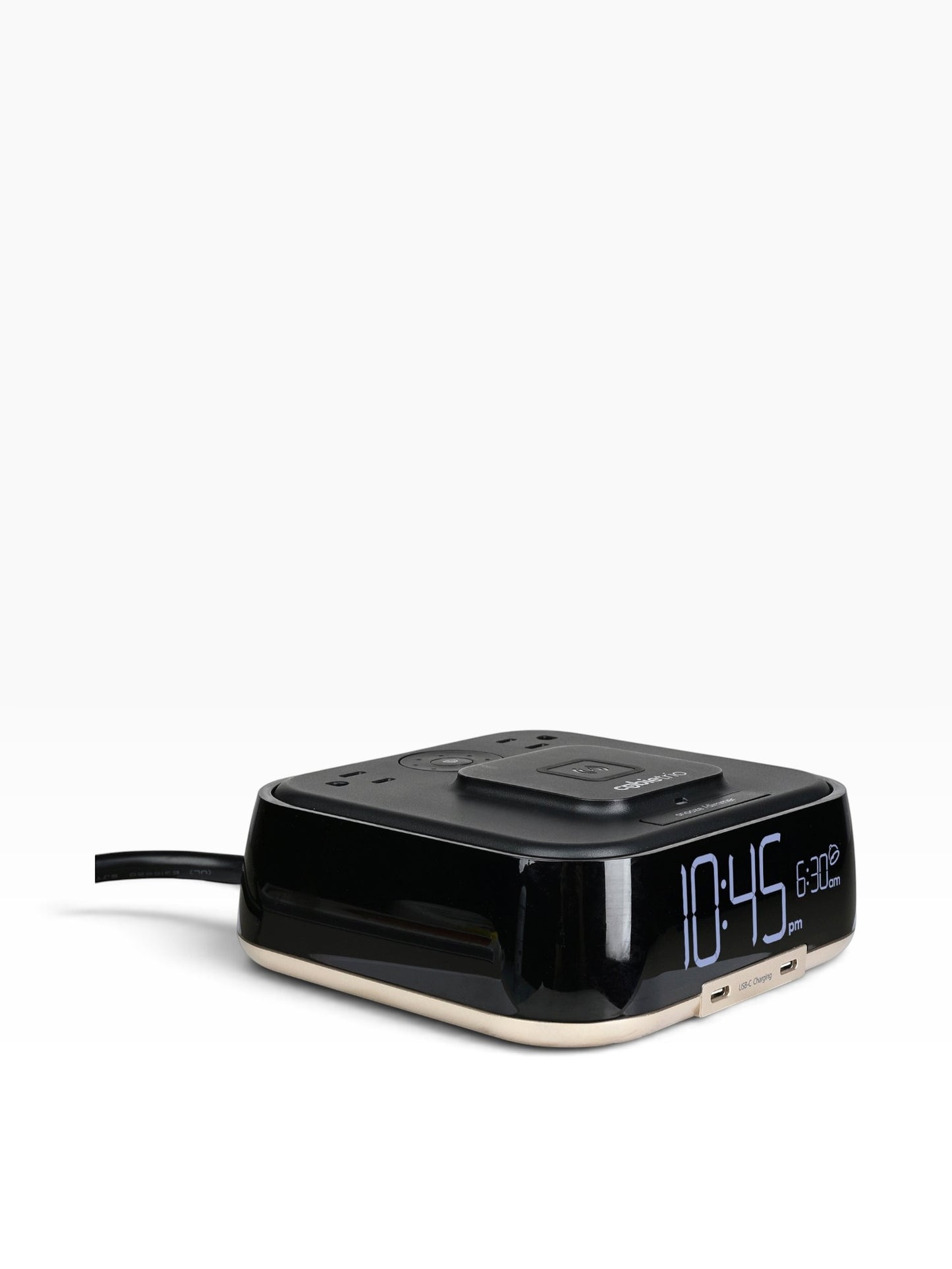 Valiant Products CubieTrio black alarm clock with wireless charging pad, USB-C ports, and power outlets on a white background