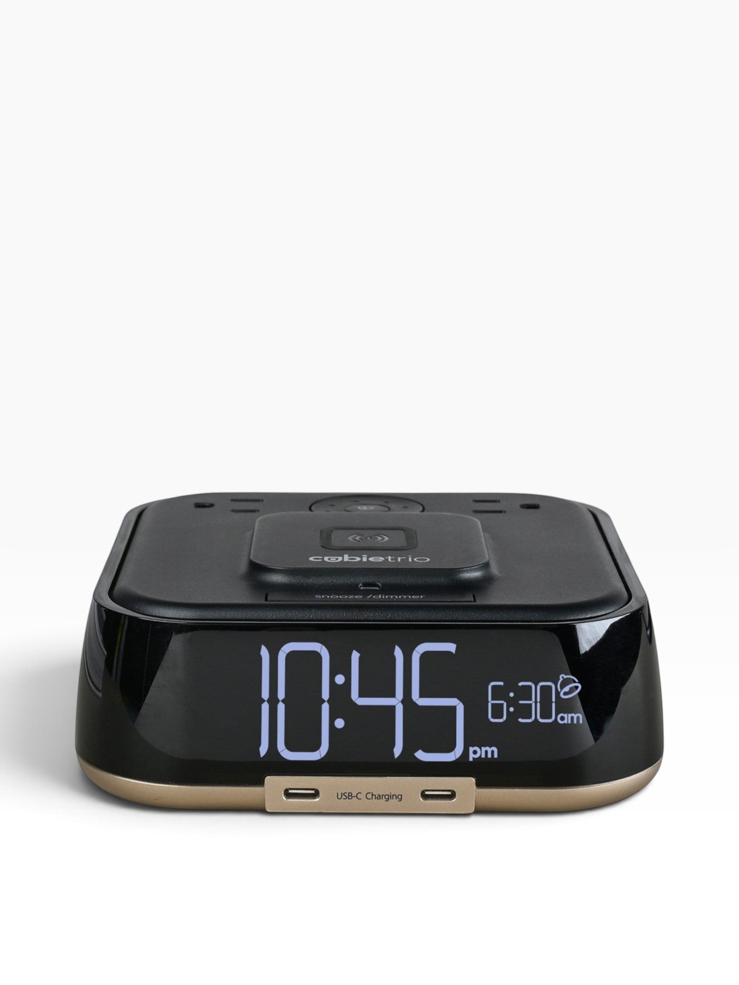 Valiant Products CubieTrio black hotel alarm clock with wireless charging pad, digital display, and two USB-C ports.
