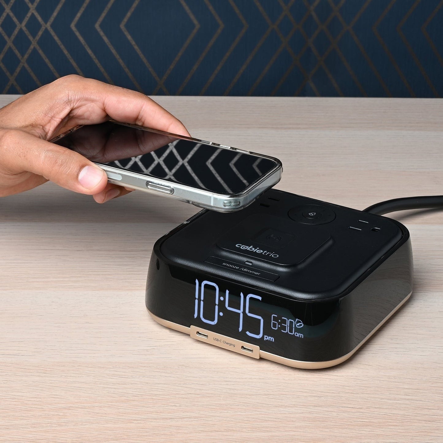 Valiant Products CubieTrio black alarm clock with wireless phone charging, USB-C ports, and digital time display