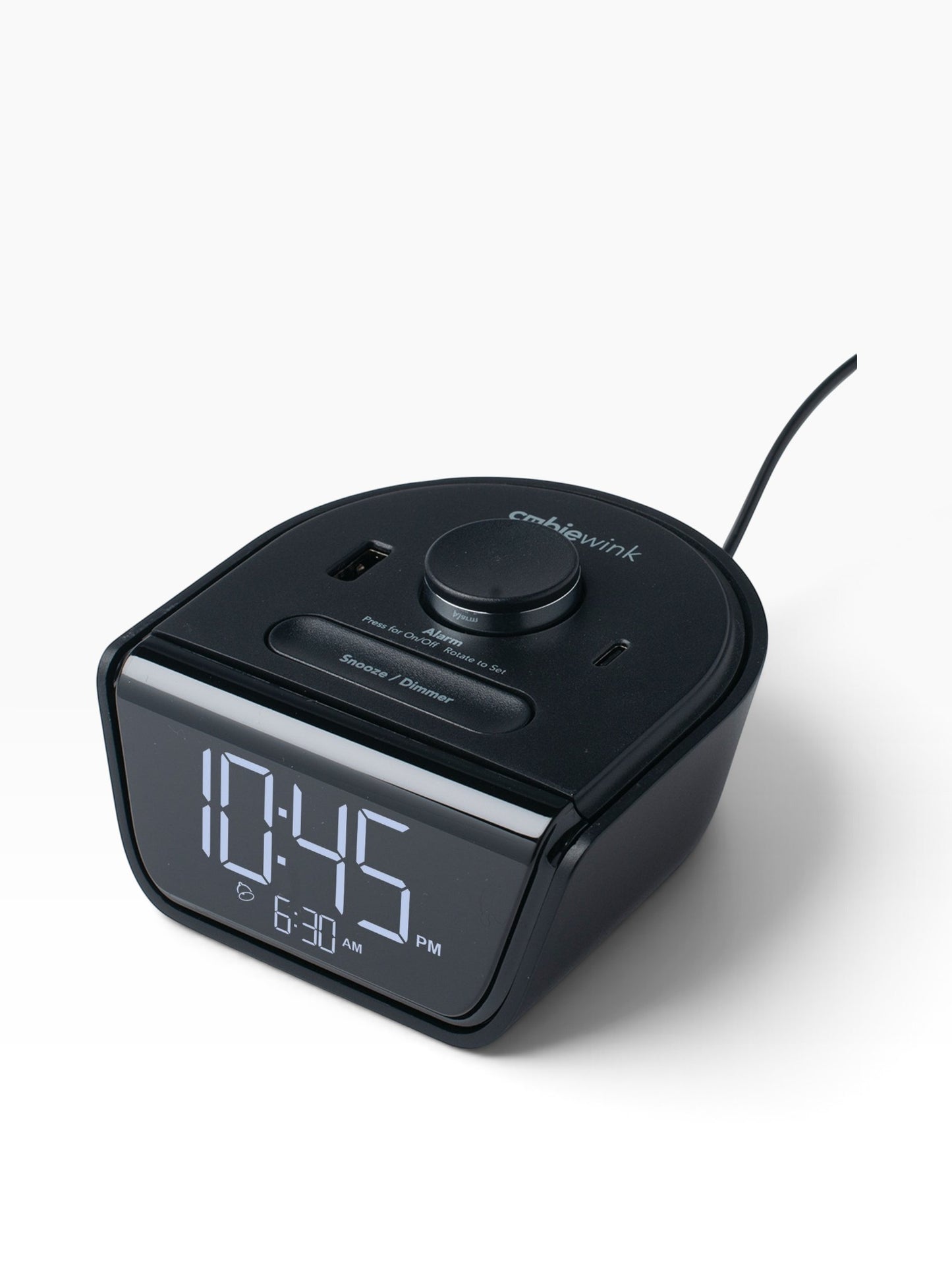 Valiant Products CubieWink black compact hotel alarm clock with USB-A and USB-C charging ports and digital display.