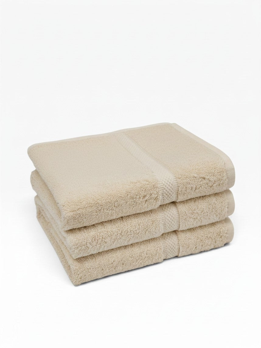 Valiant Products Brentwood ecru ring-spun cotton washcloths with a classic dobby border design.