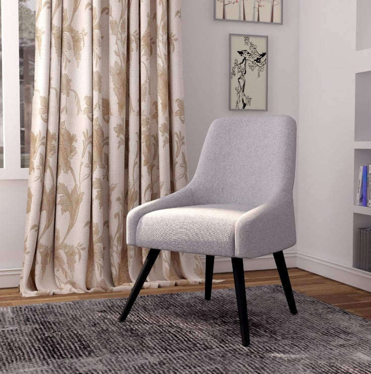Valiant Products Ellison guest lounge chair with a curved back, light gray poly-linen upholstery, and dark metal legs.