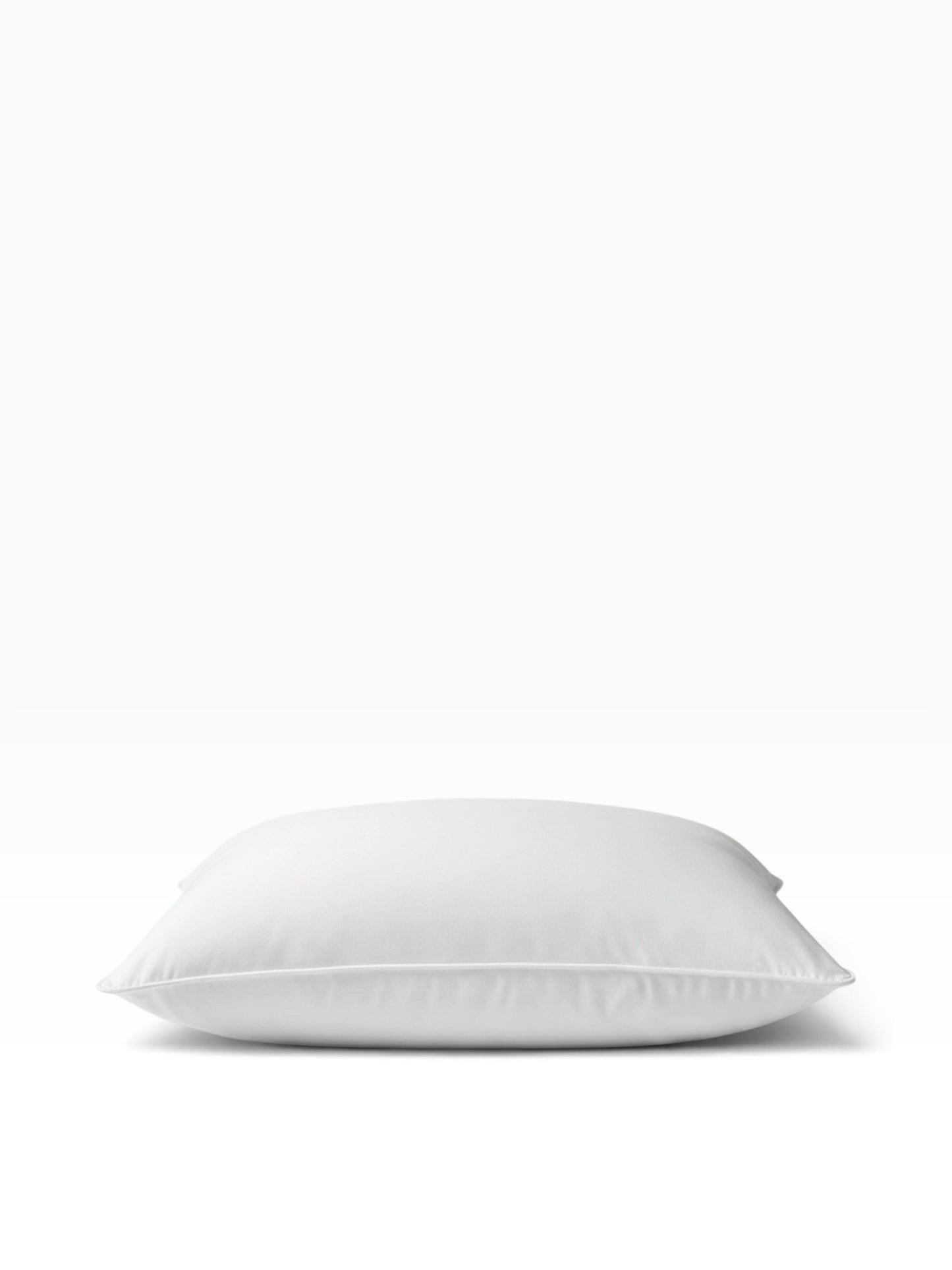 Valiant Products white firm gel pillow with piped edges for hotel-quality comfort and support.