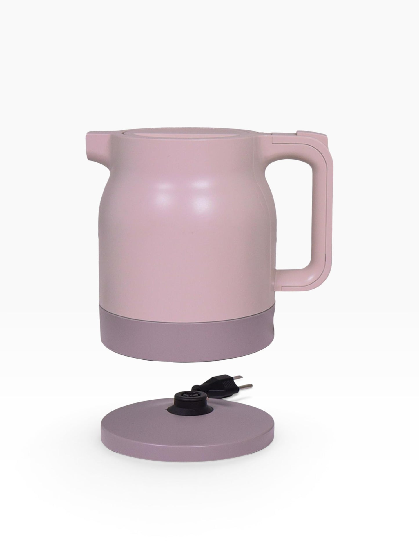 Valiant Products K-100 electric kettle in soft pink with a matching base, featuring anti-scalding insulation.