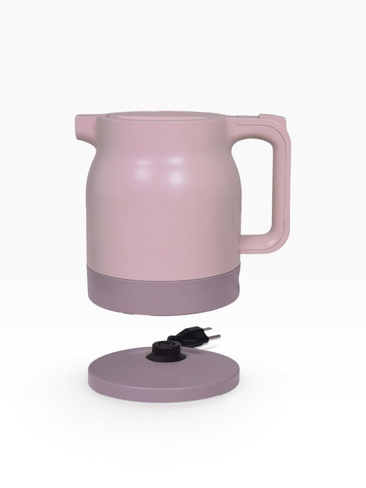 Valiant Products K-100 electric kettle in soft pink with a matching base, featuring anti-scalding insulation.