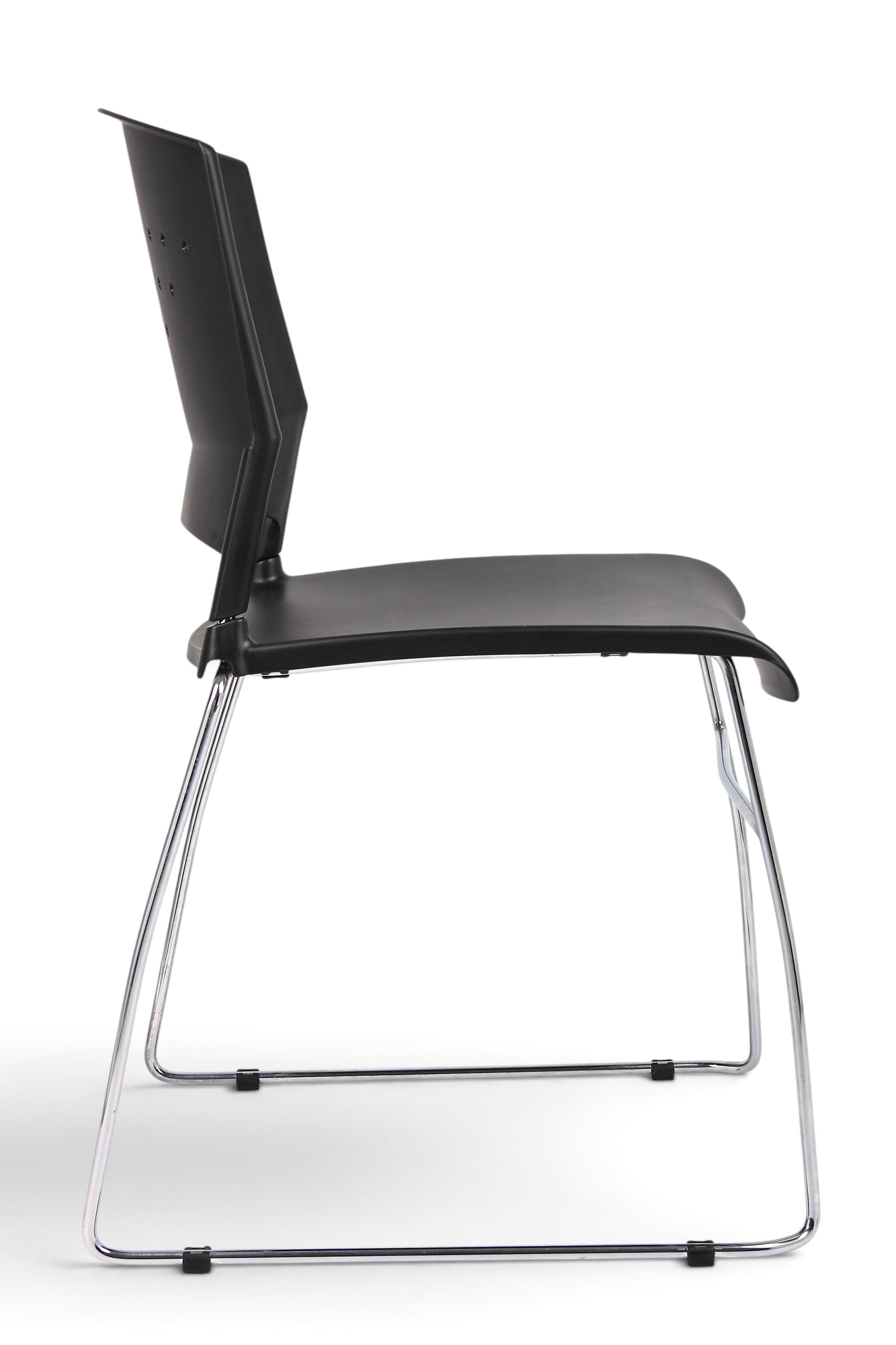 Valiant Products Kellan black polypropylene stack chair with a chrome frame shown from a side profile view.