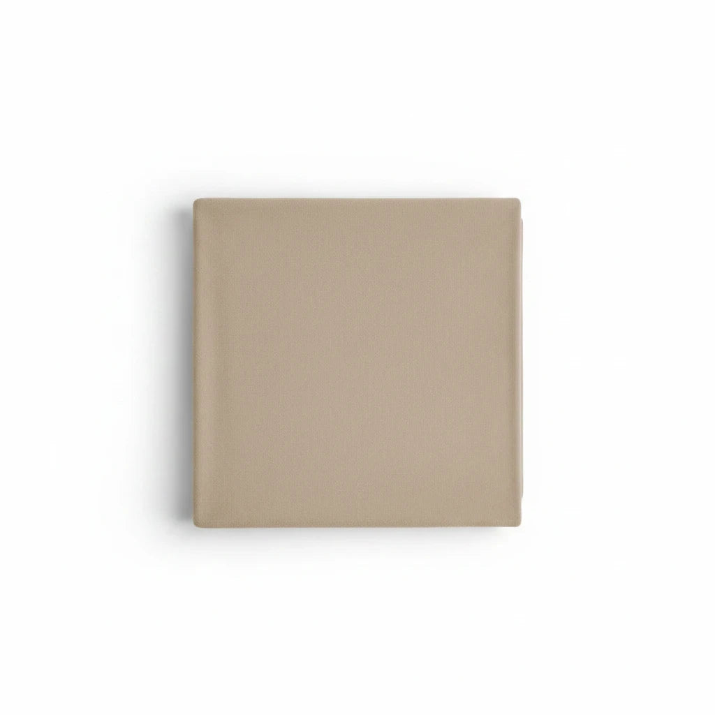 Valiant Products khaki plush microfiber blanket folded in a neat square for hospitality use.