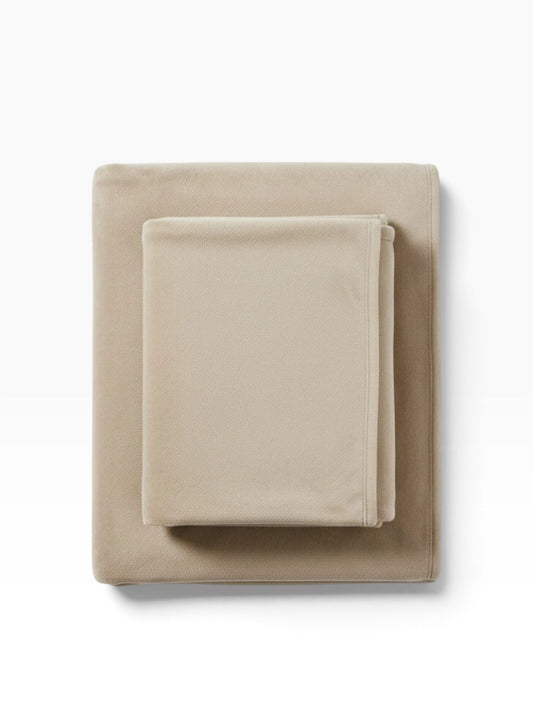 Valiant Products khaki plush microfiber blanket with a soft Raschel knit texture and tailored self-hemmed edges.