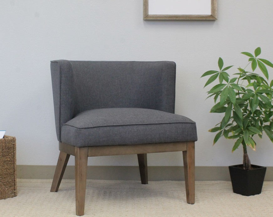 Valiant Products Langford accent chair in slate grey linen with sturdy wooden legs and a wide padded seat.