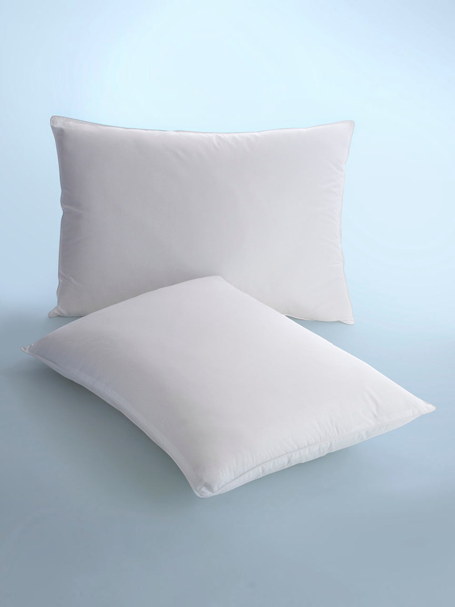 Valiant Products Martex Basics white hospitality pillows with EcoPure recycled fiberfill and durable cotton blend cover