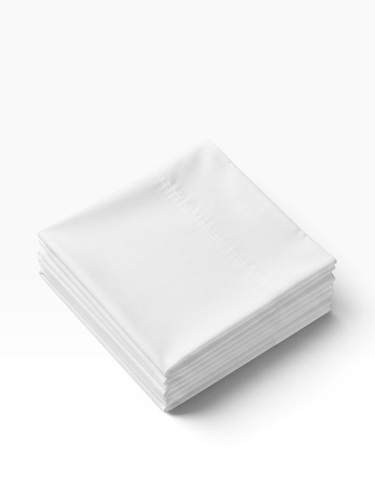 Valiant Products Millennium white 250 thread count cotton-blend percale pillowcases folded in a neat stack.