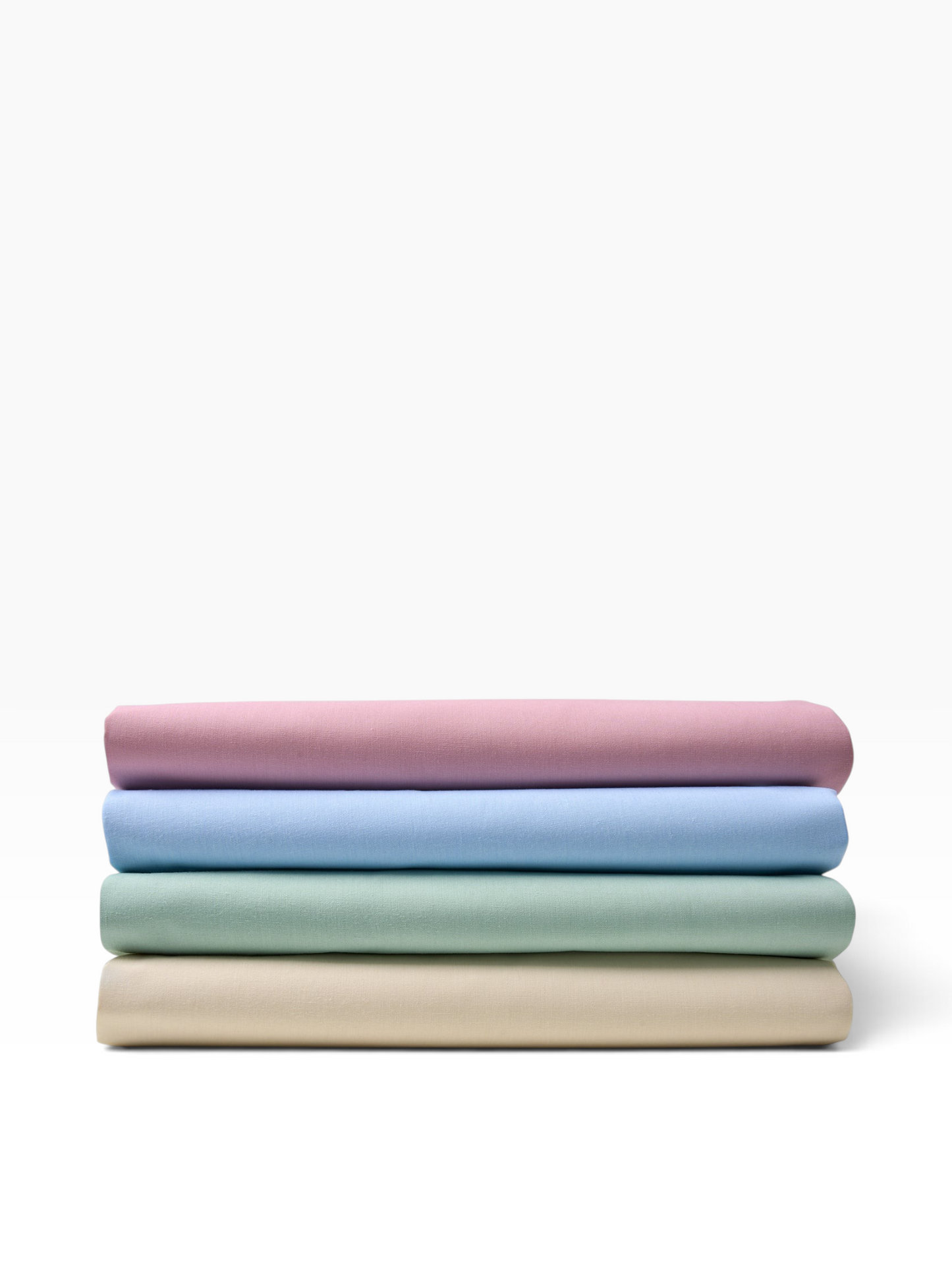 Valiant Products T-180 percale flat sheets in rose, light blue, seafoam green, and bone stacked on a white background.