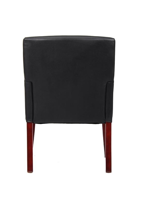 Valiant Products Perrin guest chair in black Caresoftplus vinyl with mahogany legs, viewed from the back.