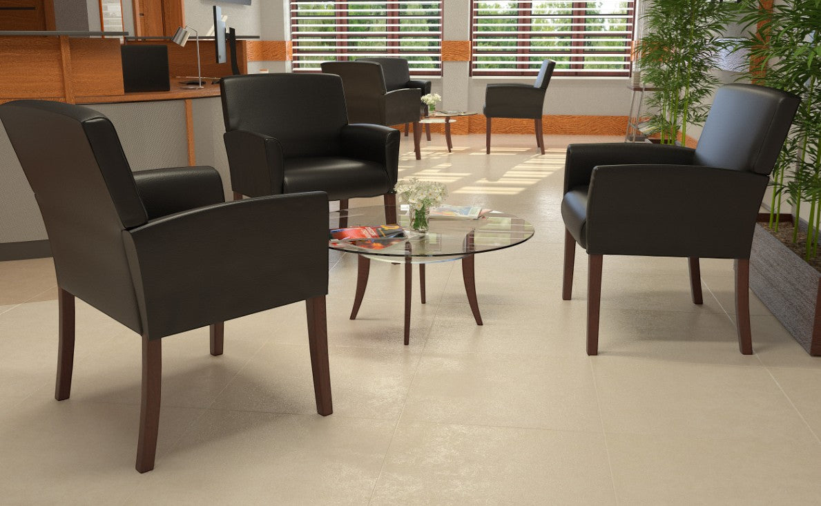 Valiant Products Perrin black vinyl guest chairs with mahogany legs arranged in a modern office reception area.