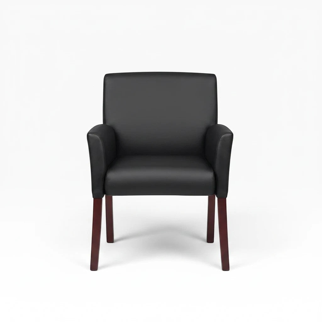 Valiant Products Perrin guest chair in black Caresoftplus vinyl with mahogany legs and ergonomic lumbar support.