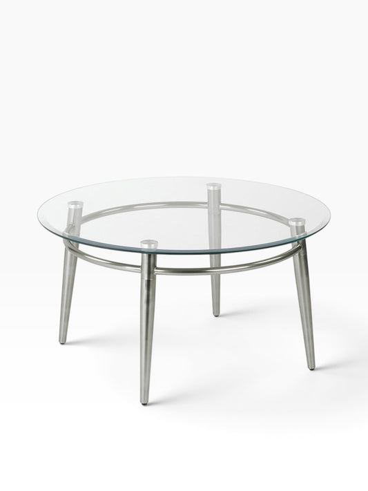 Valiant Products Brooklyn round coffee table with a clear glass top and brushed nickel metal legs on white background