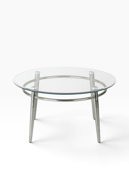 Valiant Products Brooklyn round coffee table with a clear glass top and brushed nickel metal legs
