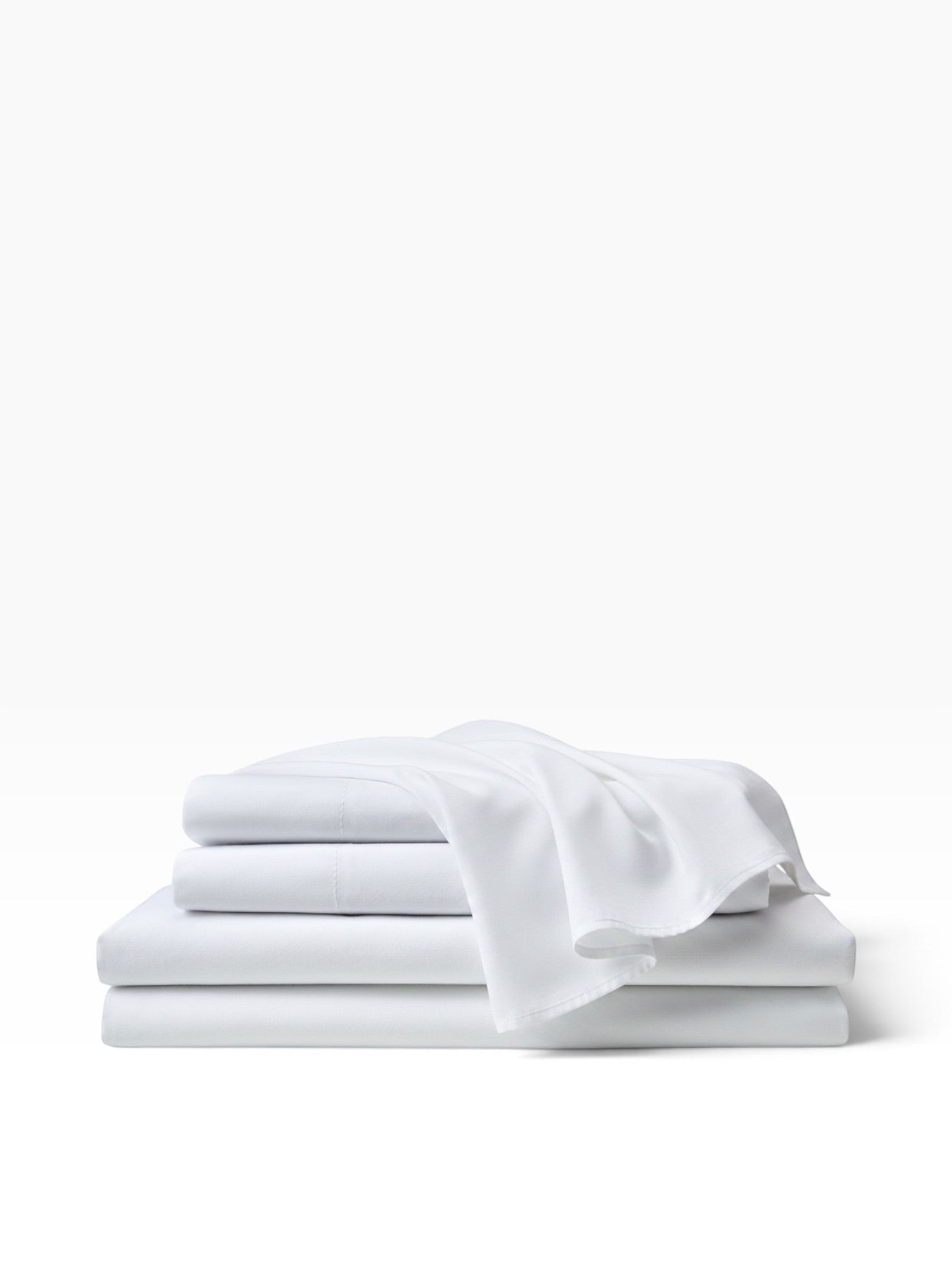 Valiant Products Simplicity 180 thread count white percale flat sheets folded in a neat stack.