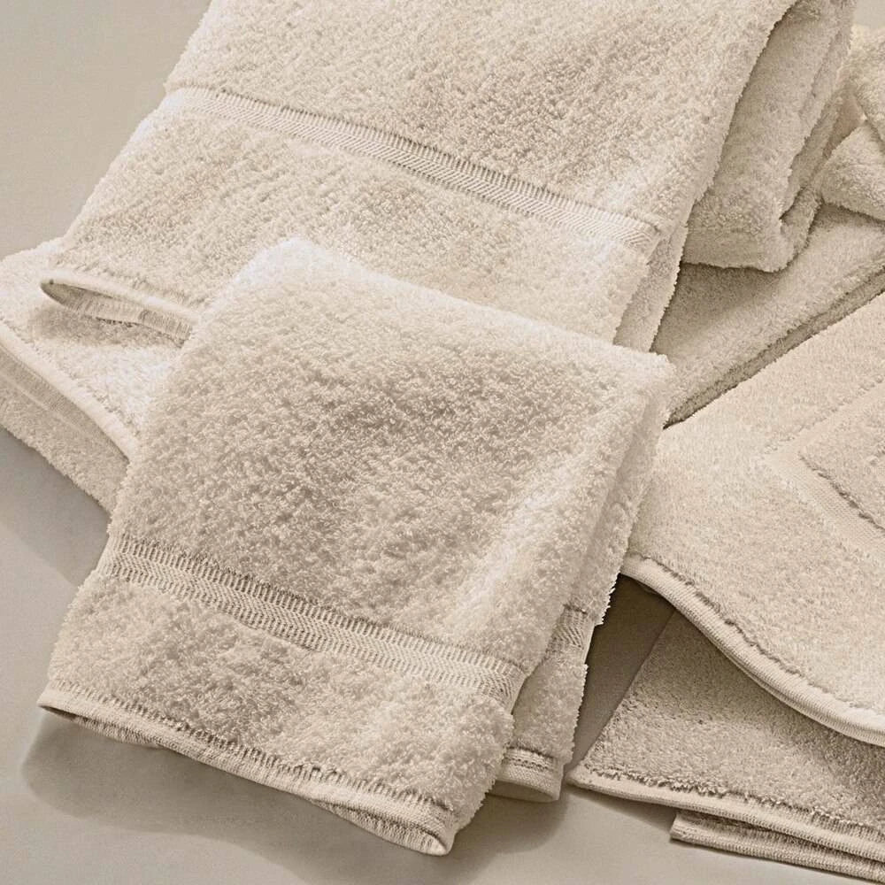 Valiant Products Sovereign ecru wash cloths featuring a traditional dobby border and durable cotton-poly blend.