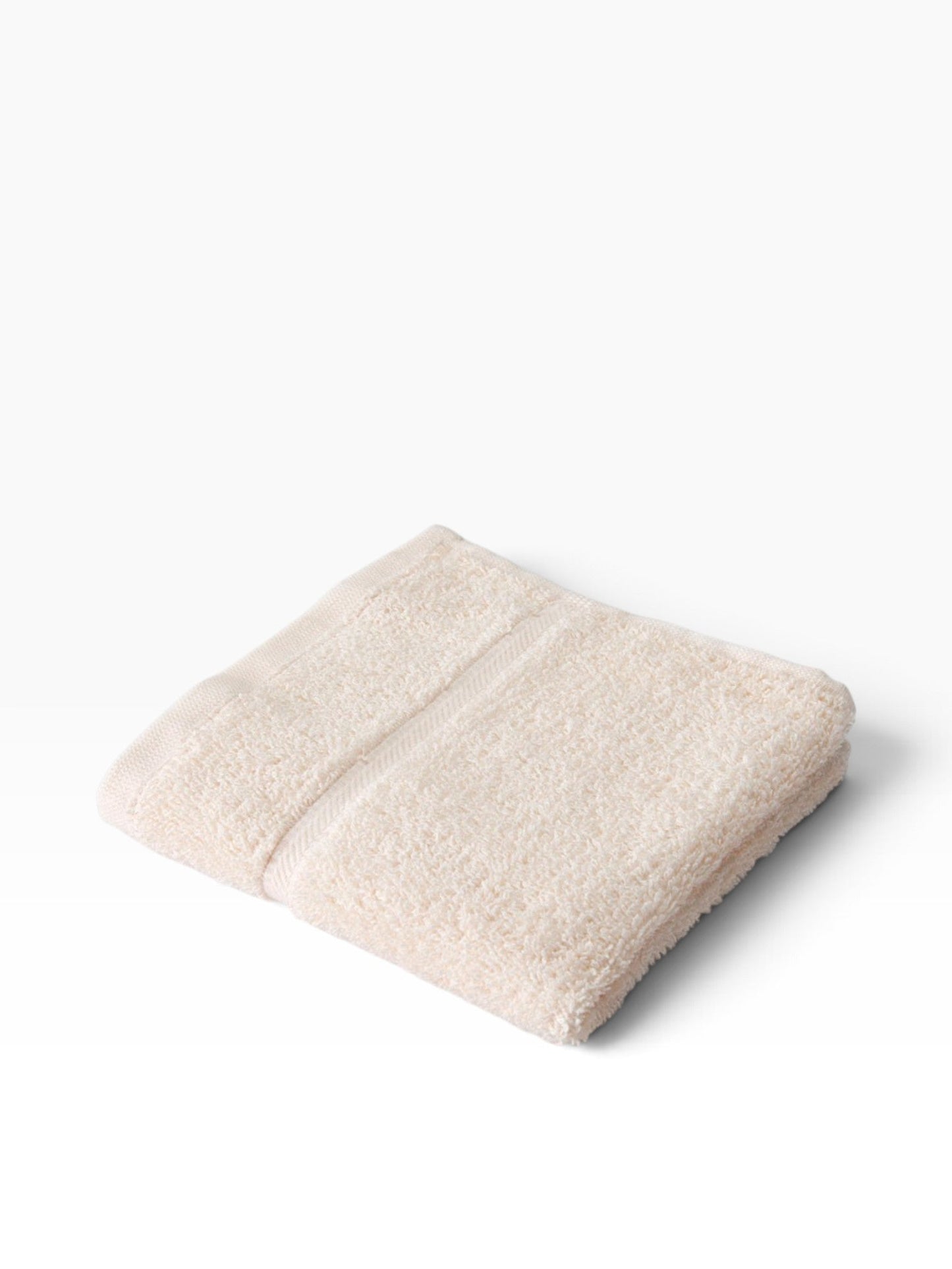 Valiant Products Sovereign ecru washcloth with a classic dobby border and durable ring-spun cotton loop construction.