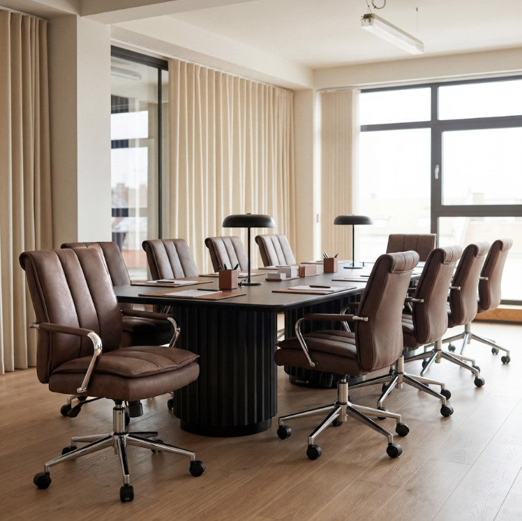 Valiant Products Stanton Pillow Top Ergo Chair with brown vinyl upholstery and chrome base in a modern office setting