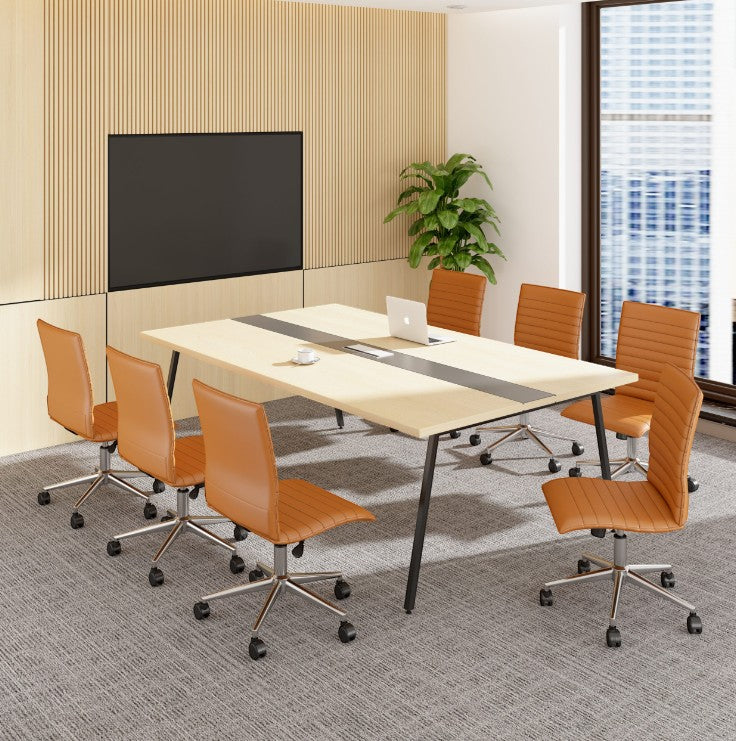 Valiant Products Starling armless ergo chairs in tan PVC vinyl with chrome bases arranged around a modern office table