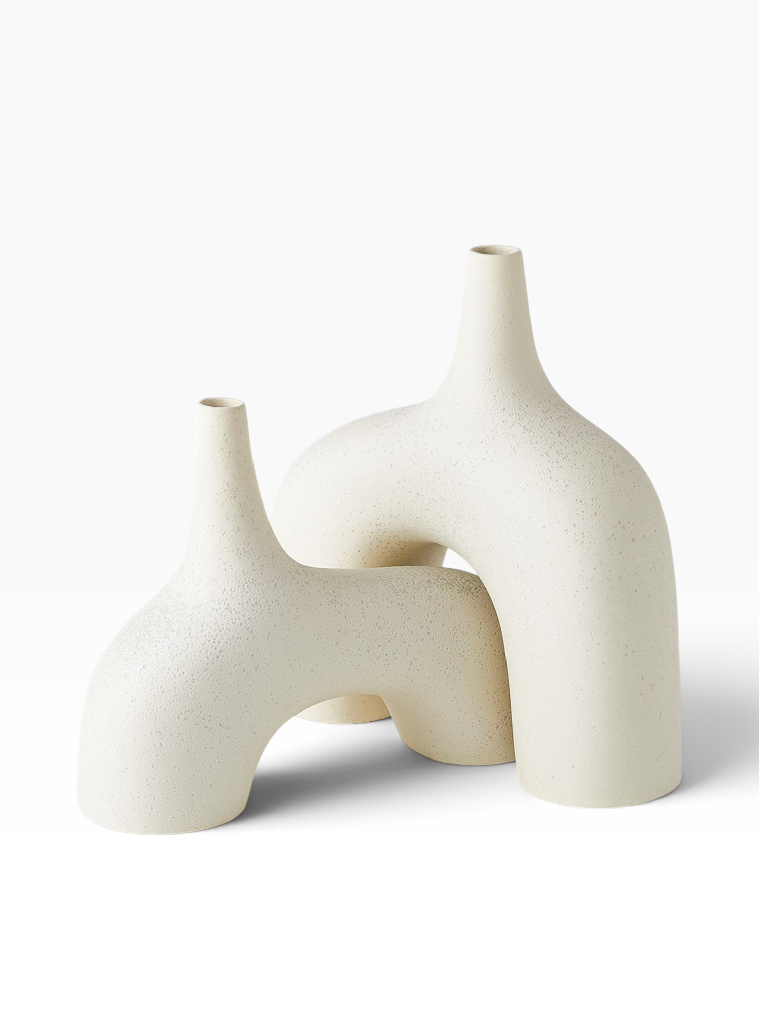 Valiant Products cream stone Stretch Vases with a textured lava glaze finish in a unique nesting sculptural design.